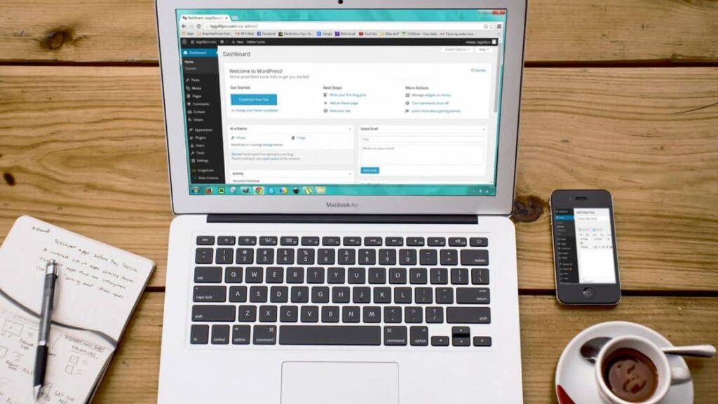 looking down on laptop with wordpress dashboard on screen